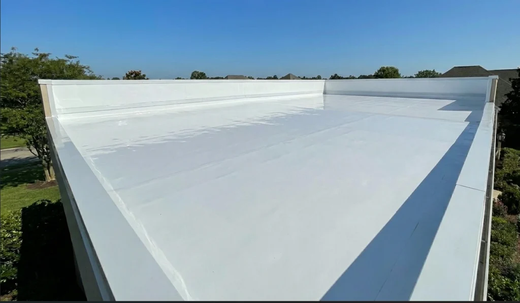 Clean and freshly coated white flat roof in Lafayette after professional restoration and sealing service